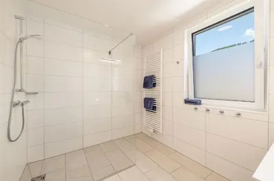Ein Badezimmer in der Unterkunft Neualm 5 - by myNests