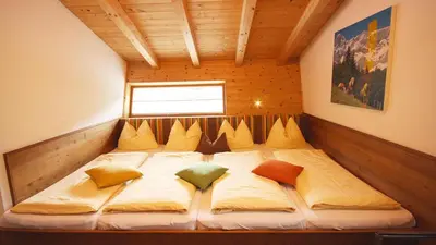 Ein Bett oder Betten in einem Zimmer der Unterkunft Alpin-Chalet Flachauwinkl