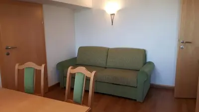 Ein Sitzbereich in der Unterkunft Peterbauerhof