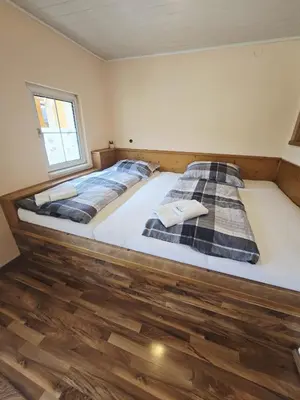 Ein Bett oder Betten in einem Zimmer der Unterkunft Goisernblick - Apartments bei Hallstatt
