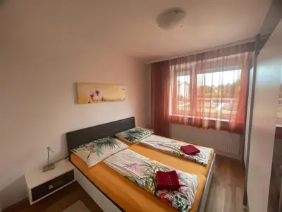 Ein Bett oder Betten in einem Zimmer der Unterkunft Apartment 6