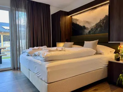 Ein Bett oder Betten in einem Zimmer der Unterkunft Gipfelglück