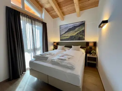 Ein Bett oder Betten in einem Zimmer der Unterkunft Gipfelglück