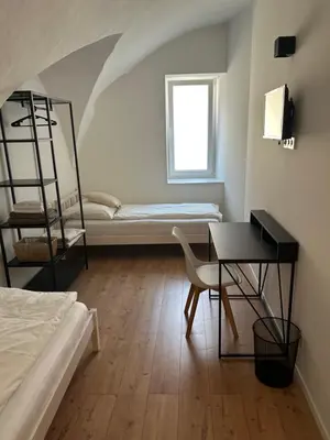 Ein Bett oder Betten in einem Zimmer der Unterkunft room4you Lambach