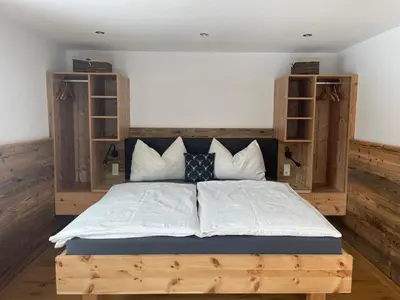 Ein Bett oder Betten in einem Zimmer der Unterkunft Kleinbergsonne