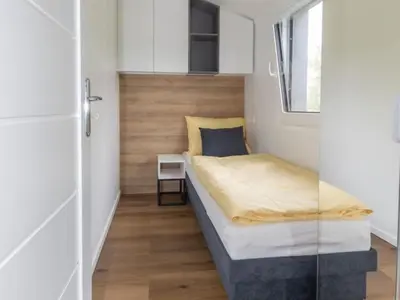 Ein Bett oder Betten in einem Zimmer der Unterkunft Holiday Home Karoline by Interhome