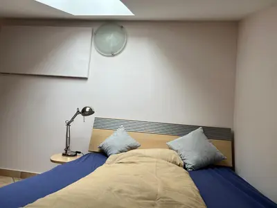 Ein Bett oder Betten in einem Zimmer der Unterkunft Tauglerei Appartement Vogelbeere