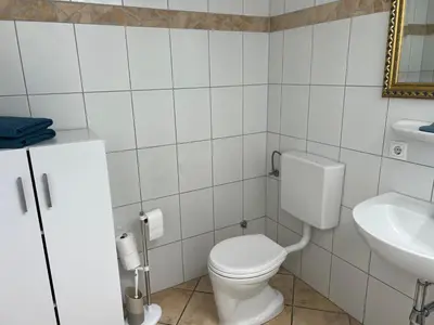 Ein Badezimmer in der Unterkunft Tauglerei Appartement Vogelbeere