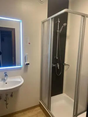 Ein Badezimmer in der Unterkunft Attergau Rooms - Self Check-In