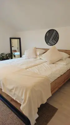 Ein Bett oder Betten in einem Zimmer der Unterkunft Ferienhaus - Hoamathaus