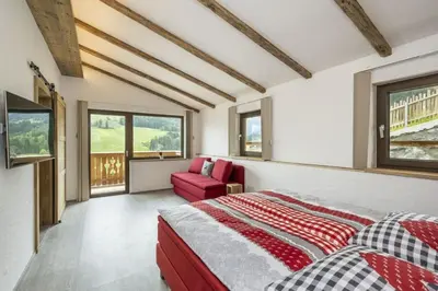 Ein Bett oder Betten in einem Zimmer der Unterkunft AAF - Familien-Chalet Gipfelblick