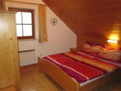 Ein Bett oder Betten in einem Zimmer der Unterkunft Erlakogelhütte am Feuerkogel