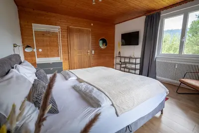 Ein Bett oder Betten in einem Zimmer der Unterkunft BacherlHouse - Apt Sickingerbach
