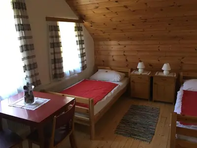 Ein Bett oder Betten in einem Zimmer der Unterkunft Villa Stadlmann