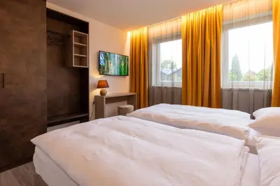 Ein Bett oder Betten in einem Zimmer der Unterkunft Lorenzhaus Exclusive Residence