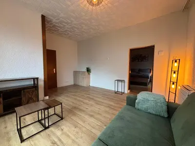 Ein Sitzbereich in der Unterkunft Ferienwohnung Fuchs