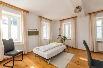 Ein Bett oder Betten in einem Zimmer der Unterkunft Die große Hoamat