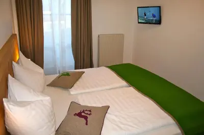 Ein Bett oder Betten in einem Zimmer der Unterkunft Appartementhaus Reiter