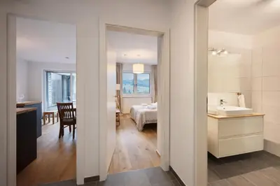 Ein Bett oder Betten in einem Zimmer der Unterkunft Die Malerei Penthouse by Da Alois
