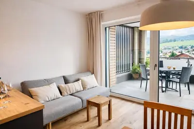 Ein Sitzbereich in der Unterkunft Die Malerei Penthouse by Da Alois