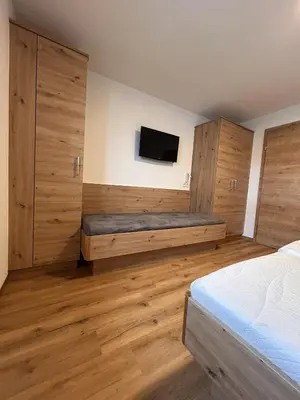 Ein Bett oder Betten in einem Zimmer der Unterkunft Höller's Bergleben