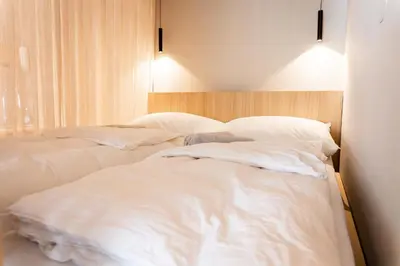 Ein Bett oder Betten in einem Zimmer der Unterkunft Design Apartment Bad Aussee
