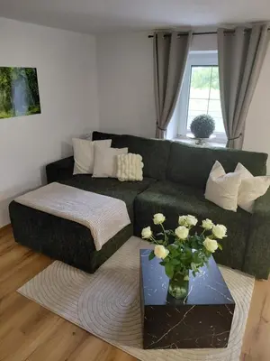 Ein Sitzbereich in der Unterkunft Ferienwohnung Kofler