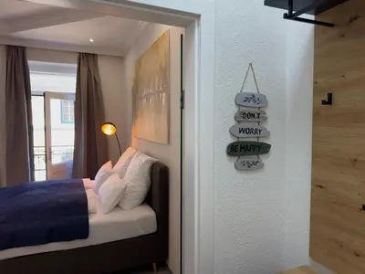 Ein Bett oder Betten in einem Zimmer der Unterkunft Mittelpunkt Aussee
