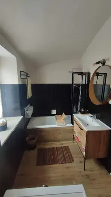 Ein Bett oder Betten in einem Zimmer der Unterkunft Alte Hafnerei
