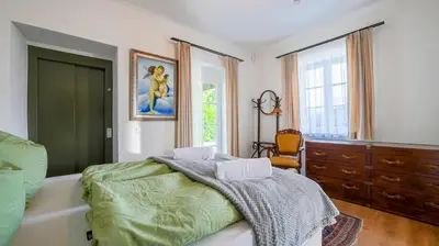 Ein Bett oder Betten in einem Zimmer der Unterkunft Villa Victoria by Landluft