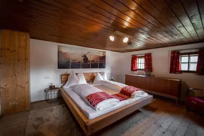 Ein Bett oder Betten in einem Zimmer der Unterkunft Artlieb Hütte