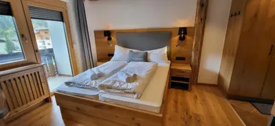 Ein Bett oder Betten in einem Zimmer der Unterkunft Bergidyll 8 by Alpenidyll Apartments