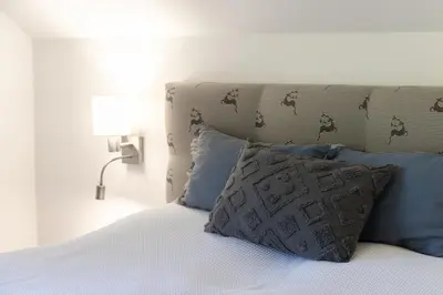 Ein Bett oder Betten in einem Zimmer der Unterkunft Chalet Aineck Snowwhite