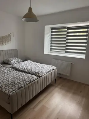 Ein Bett oder Betten in einem Zimmer der Unterkunft Apartment Nice in Gmunden