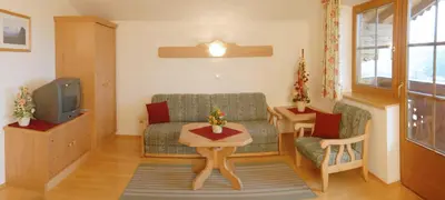 Ein Sitzbereich in der Unterkunft Appartmenthaus Geroldhof