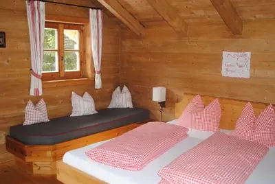 Ein Bett oder Betten in einem Zimmer der Unterkunft Loimoarhütte