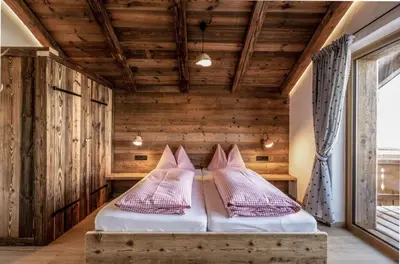 Ein Bett oder Betten in einem Zimmer der Unterkunft Chalet Hauserberg
