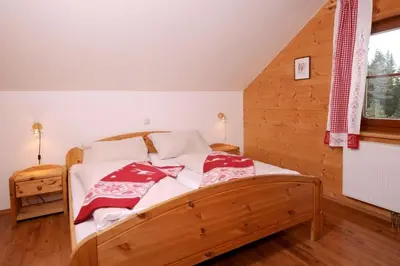 Ein Bett oder Betten in einem Zimmer der Unterkunft Almdorf Katschberg