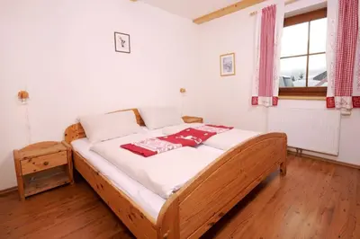 Ein Bett oder Betten in einem Zimmer der Unterkunft Almdorf Katschberg