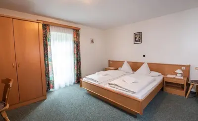 Ein Bett oder Betten in einem Zimmer der Unterkunft Ferienhaus Lacknerhof