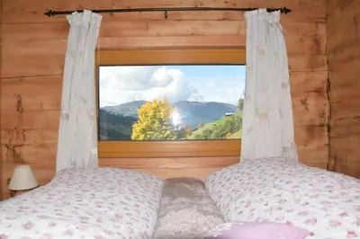 Ein Bett oder Betten in einem Zimmer der Unterkunft Achtchalet