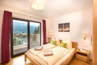 Ein Bett oder Betten in einem Zimmer der Unterkunft Feriendomizil zeitGenuss