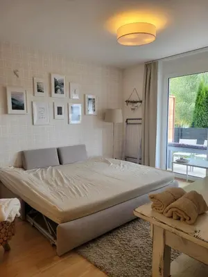 Ein Bett oder Betten in einem Zimmer der Unterkunft Grimminglounge