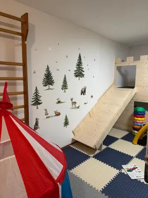 Ein Bett oder Betten in einem Zimmer der Unterkunft Gipfelruhe-ganzes Ferienhaus mit Sauna, Garten & Spielzimmer- Ramsau am Dachstein