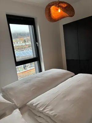 Ein Bett oder Betten in einem Zimmer der Unterkunft Appartement GLÜCKSVOGEL