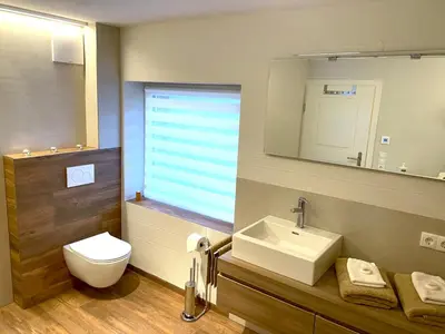 Ein Badezimmer in der Unterkunft Stoltzis Appartement