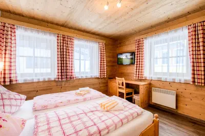 Ein Bett oder Betten in einem Zimmer der Unterkunft Schmiedlehenalm