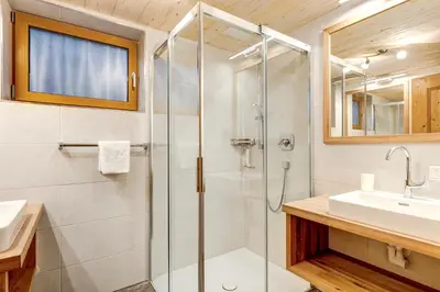 Ein Badezimmer in der Unterkunft Schmiedlehenalm