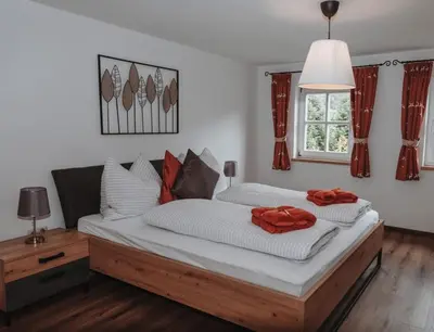 Ein Bett oder Betten in einem Zimmer der Unterkunft Hohlbichlgut