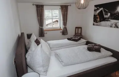 Ein Bett oder Betten in einem Zimmer der Unterkunft Hohlbichlgut